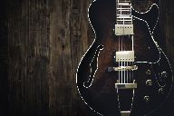 Guitar Player Logo