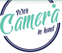 With Camera In Hand Logo